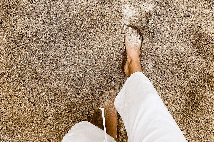 Walking On The Beach Barefoot